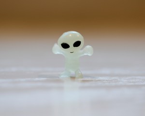 Tiny, glow-in-the-dark alien.